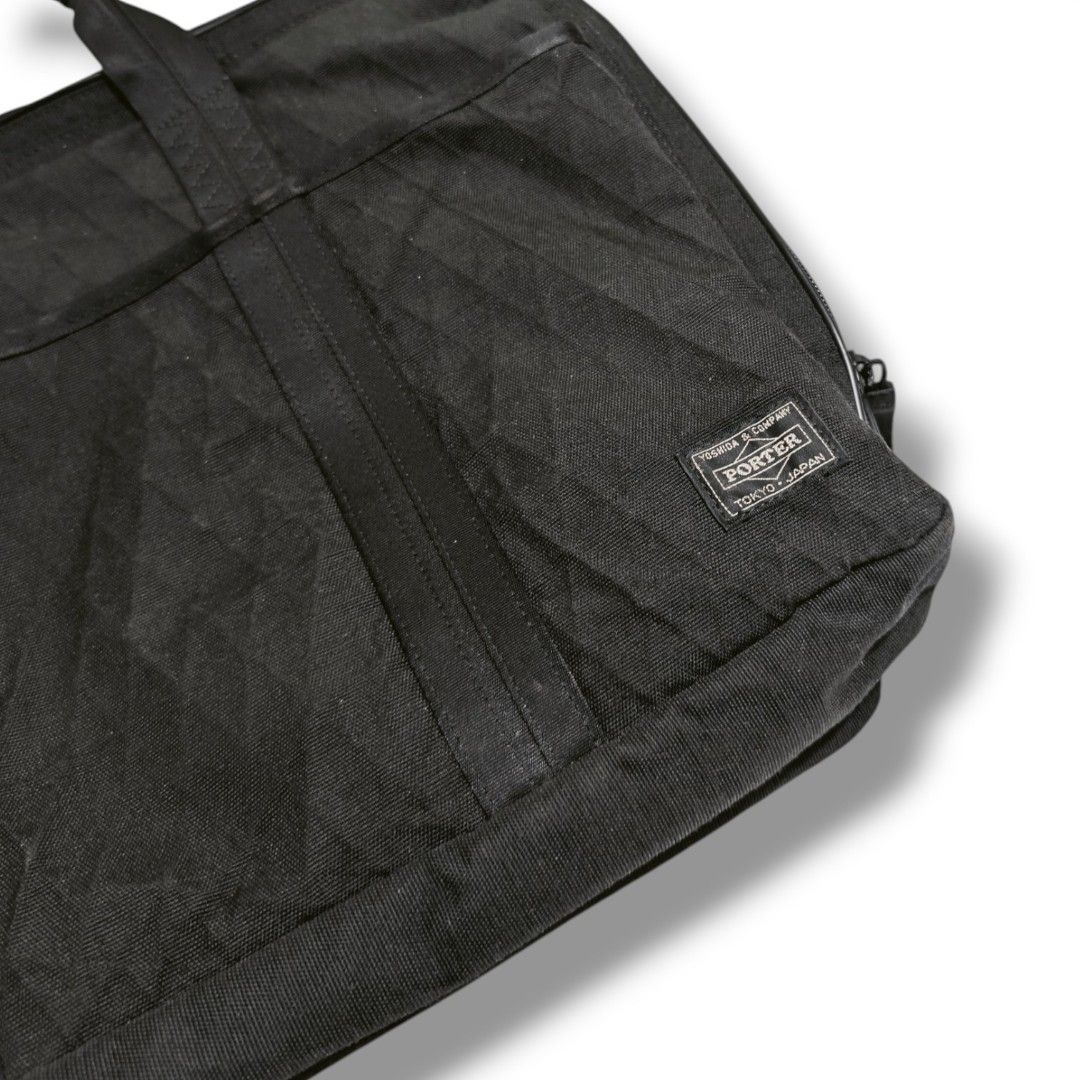 Porter Yoshida & Co. Black 3Way Briefcase Backpack (Category: Briefcases) located in Cabuyao City. Submitted by 0ld_souls (Listing ID 1469458205, Image 2). Description: - Brand: Porter Yoshida & Co. - Color: Classic Black - Material: Ultra-durable Cordura fabric - Versatility: 2-way design that converts from a briefcase into a backpack with stowable straps - Storage: Multiple zipped compartments, interior mesh pockets, and front slip pockets - Br