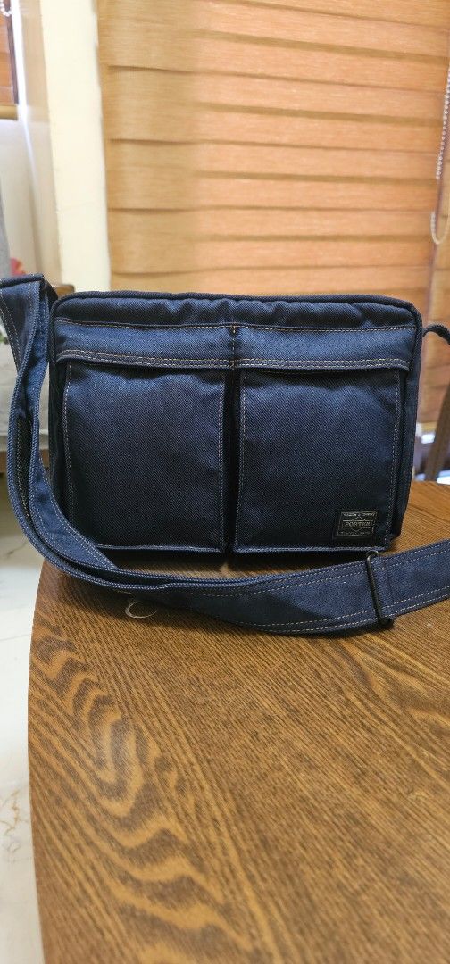 Porter Yoshida & Co. Sling (Category: Sling Bags) located in Navotas City. Submitted by walburst (Listing ID 1469437344, Image 1). Description: Head Porter / Porter Yoshida & Co. 2016 Indigo Collection Rare and Discontinued Made in Japan Pristine condition While the bag appear to be made of denim, they are actually a blend of nylon and synthetic fibers, making them virtually indistinguishable. This blend is more durable than pure cotton denim, an