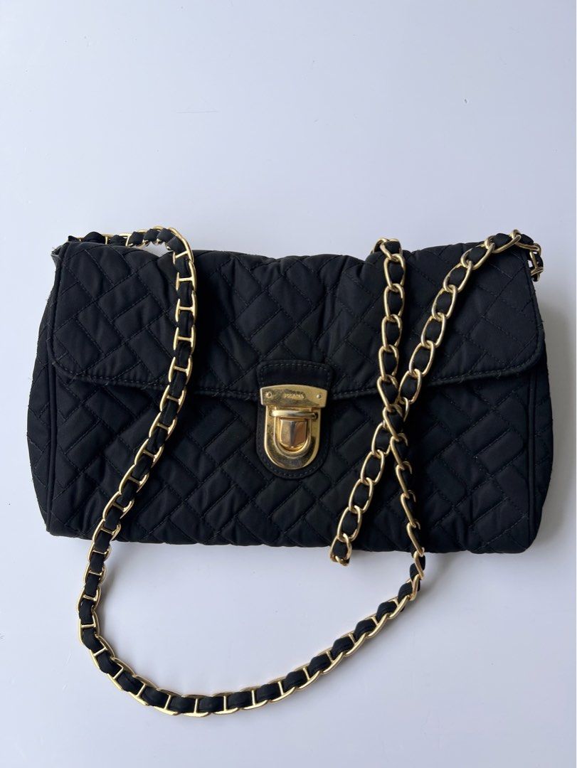 PRADA - QUILTED CHAIN SHOULDER BAG (Category: Luxury Bags & Wallets) located in Cavite. Submitted by _Gizmo (Listing ID 1469484065, Image 2). Description: Prada - Quilted Chain Shoulder Bag Measurement Width: 10’ Inch Height: 6’ Inch Condition: 9/10 No major flaws.