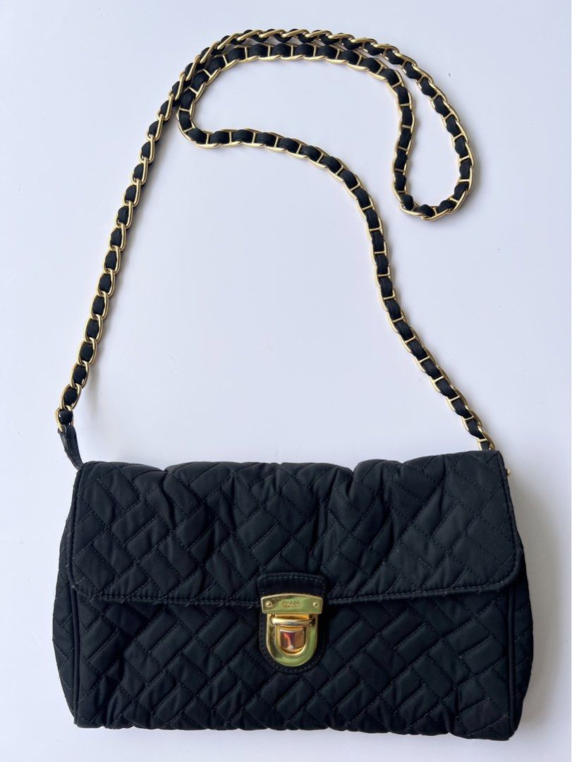 PRADA - QUILTED CHAIN SHOULDER BAG (Category: Luxury Bags & Wallets) located in Cavite. Submitted by _Gizmo (Listing ID 1469484065, Image 1). Description: Prada - Quilted Chain Shoulder Bag Measurement Width: 10’ Inch Height: 6’ Inch Condition: 9/10 No major flaws.