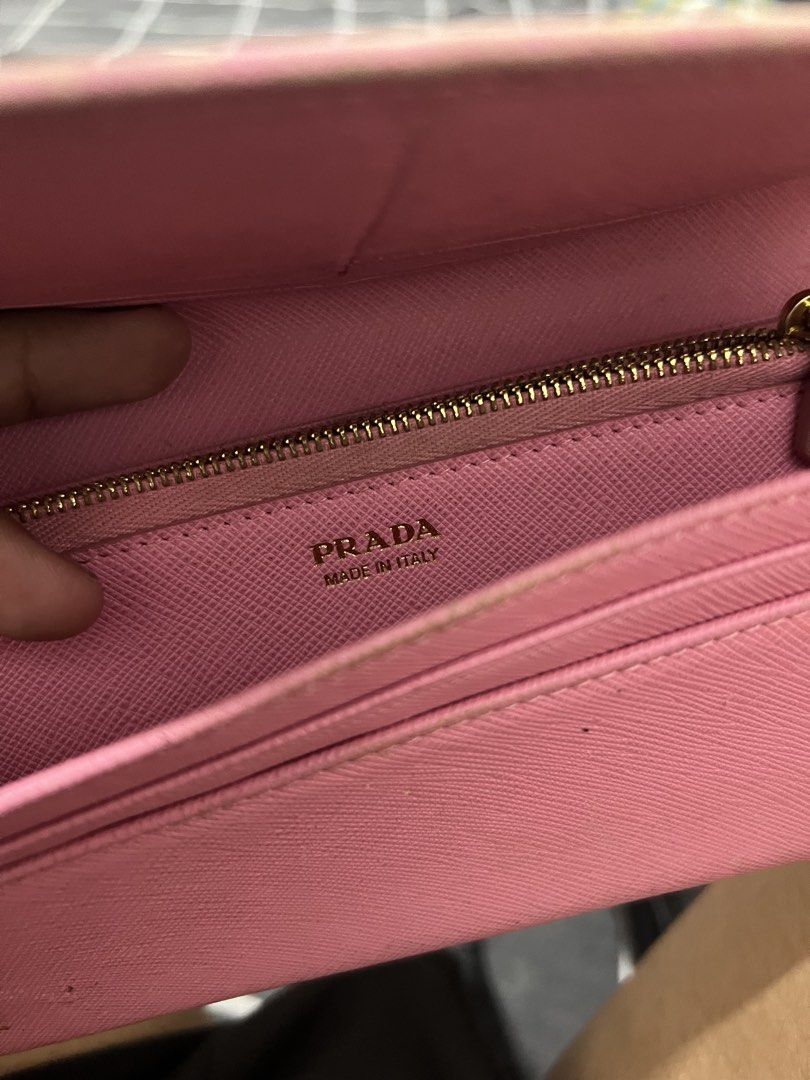 Prada - Wallet - Leather (Category: Wallets & Card Holders) located in Cavite. Submitted by asianluxe (Listing ID 1469526847, Image 3). Description: Good condition Very presentable Minimal flaw Authentic .