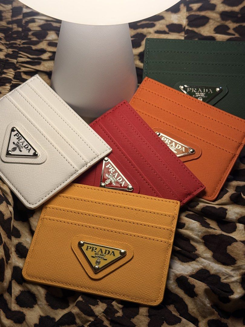 Prada Card Holders (Category: Wallets & Card Holders) located in Lapu Lapu. Submitted by bzzzzarah (Listing ID 1469563666, Image 1). Description: Pre-Order Colors Available: Yellow Pink Orange Dark Green White Black Brown Blue Red.