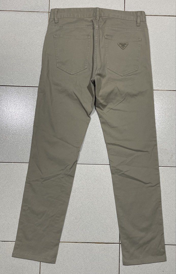 Prada Pants (Category: Chinos) located in Mandaue City. Submitted by MJ_80 (Listing ID 1469414018, Image 3). Description: Mens Prada Pants Skinny Stretch Size 30 on tag Fits 29-30 Waist See photos for measurements Issue : Logo last Letter A erased yung beige na kulay. The rest intact. & also has tiny dot stain, not noticeable Color rate & Condition: 9.9/10 Price: 3,350 .