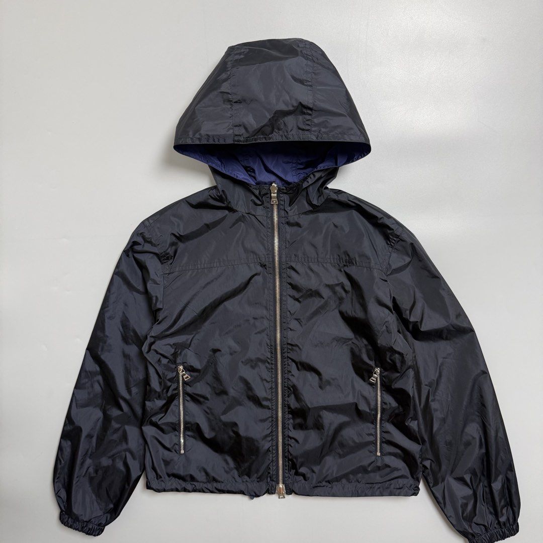 Prada Reversible Nylon Navy/Black Embroidered Light Jacket (Category: Coats, Jackets and Outerwear) located in Cebu City. Submitted by inukaybyjlf (Listing ID 1469560990, Image 3). Description: Condition: Good as new Issue: No flaws Dimensions: 18.4x20 Best fit: S-M Please refer to photos for actual condition .