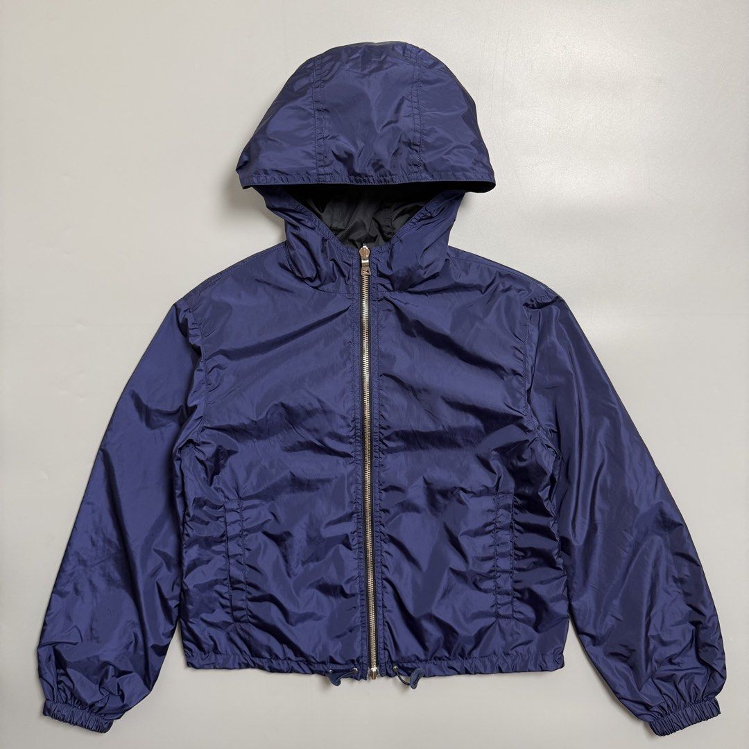 Prada Reversible Nylon Navy/Black Embroidered Light Jacket (Category: Coats, Jackets and Outerwear) located in Cebu City. Submitted by inukaybyjlf (Listing ID 1469560990, Image 1). Description: Condition: Good as new Issue: No flaws Dimensions: 18.4x20 Best fit: S-M Please refer to photos for actual condition .