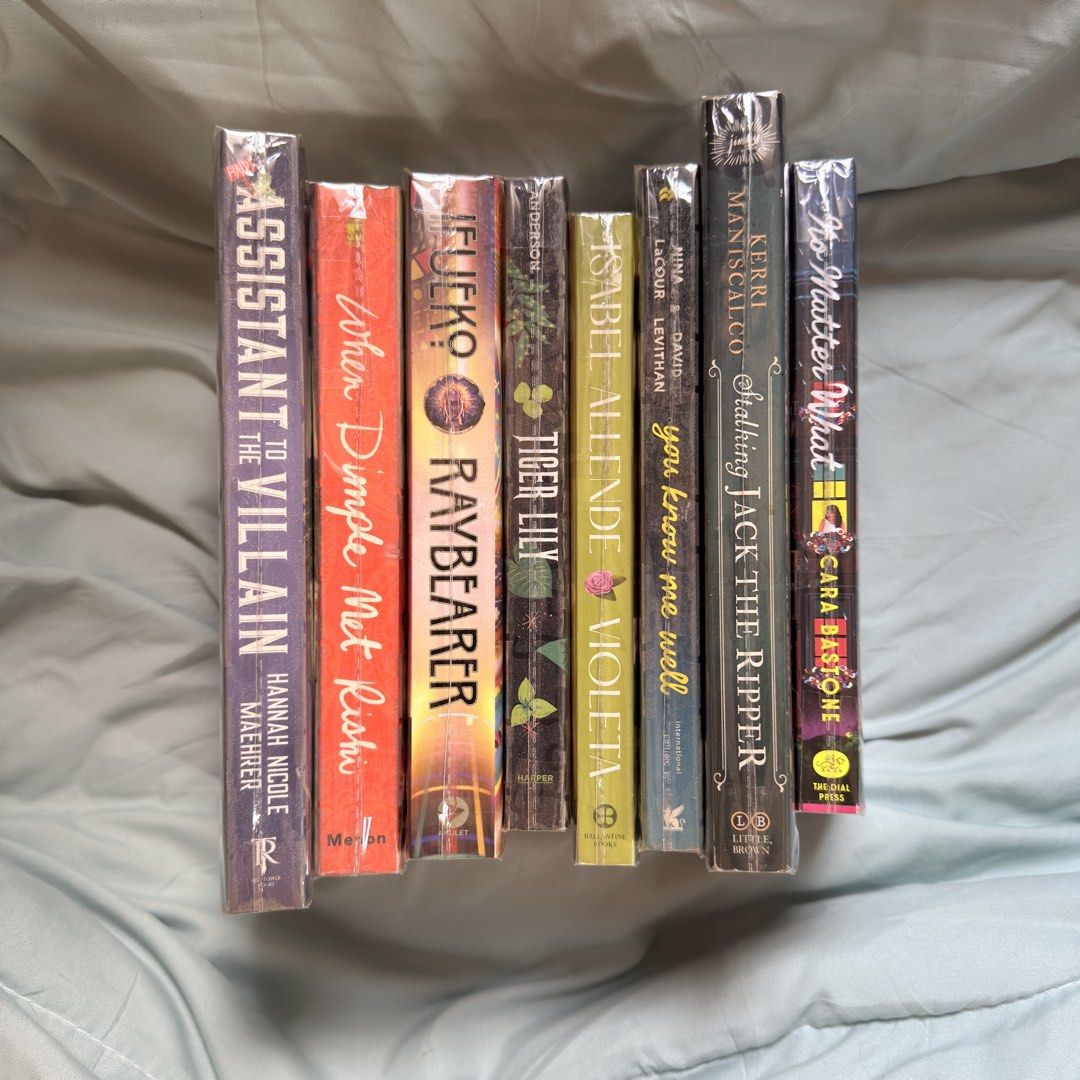 PRELOVED BOOKS (fantasy, romance, YA) (Category: Storybooks) located in Taguig. Submitted by wtfprkjm (Listing ID 1469440392, Image 1). Description: No Matter What by Cara Bastone (read once, like new) - ₱500 Stalking Jack the Ripper by Kerri Maniscalco (severe tanning) - ₱100 Assistant to the Villain by Hannah Nicole Maehrer (slight yellowing, foxing) - ₱300 Raybearer by Jordan Ifueko (severe tanning, foxing) - ₱50 When Dimple Meet Rishi by Sand