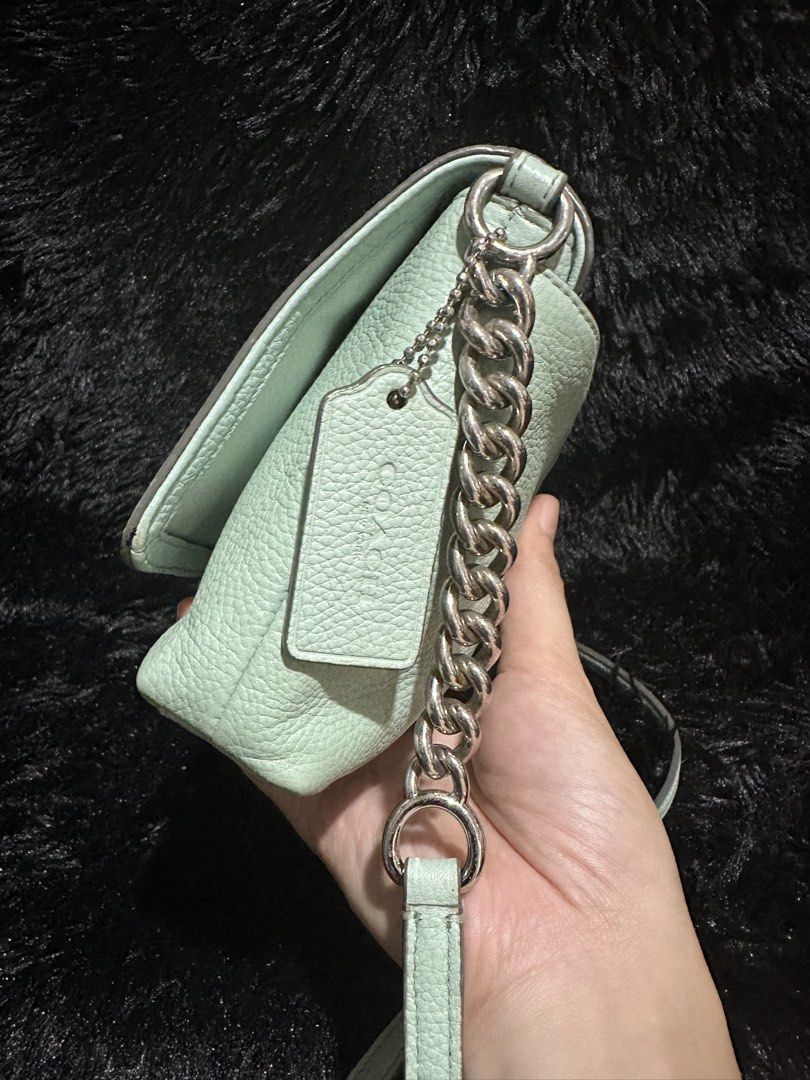 Preloved Coach crosstown sling bag original 💯 (Category: Cross-body Bags) located in Caloocan City. Submitted by rqueenluxuryph (Listing ID 1469559341, Image 3). Description: Preloved coach crosstown sling bag original 💯 Mint green Condition rate: 8/10 Honest issue: no minor and major flaw Sign of usage only .
