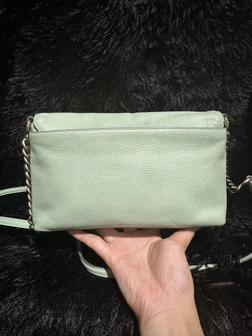 Preloved Coach crosstown sling bag original 💯 (Category: Cross-body Bags) located in Caloocan City. Submitted by rqueenluxuryph (Listing ID 1469559341, Image 2). Description: Preloved coach crosstown sling bag original 💯 Mint green Condition rate: 8/10 Honest issue: no minor and major flaw Sign of usage only .