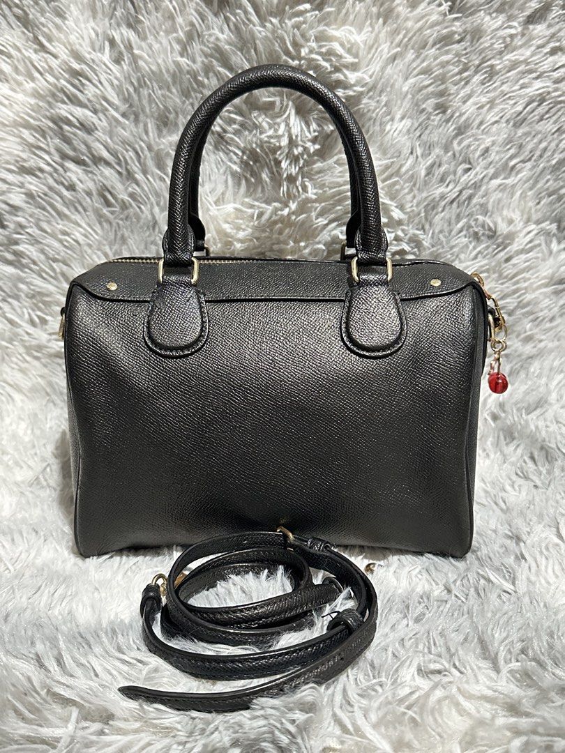 Preloved coach mini bennett black original 💯 (Category: Cross-body Bags) located in Caloocan City. Submitted by rqueenluxuryph (Listing ID 1469563684, Image 2). Description: Preloved coach mini bennett original 💯 Condition rate: 8/10 Honest issue: zipper puller lost Creed bakbak Hardware faded and scratches over all maganda ang condition ng bag .