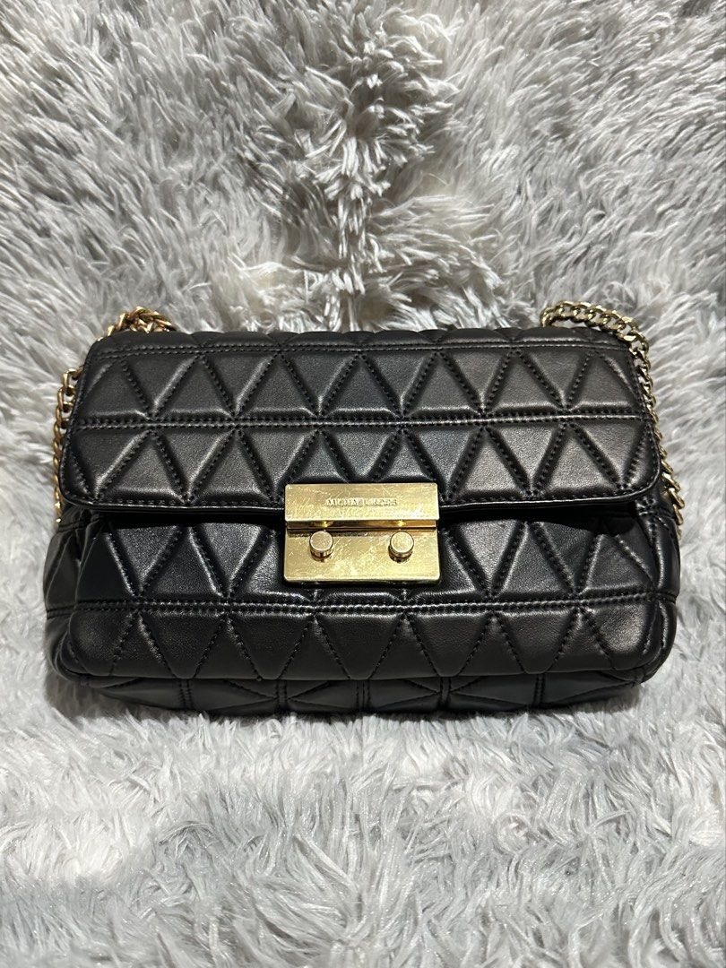 Preloved Mk Quilted flap bag original 💯 (Category: Cross-body Bags) located in Caloocan City. Submitted by rqueenluxuryph (Listing ID 1469564069, Image 1). Description: Preloved mk quilted flap bag original 💯 Condition rate: 8/10 Honest issue: chain hardware tarnish UN lng po .