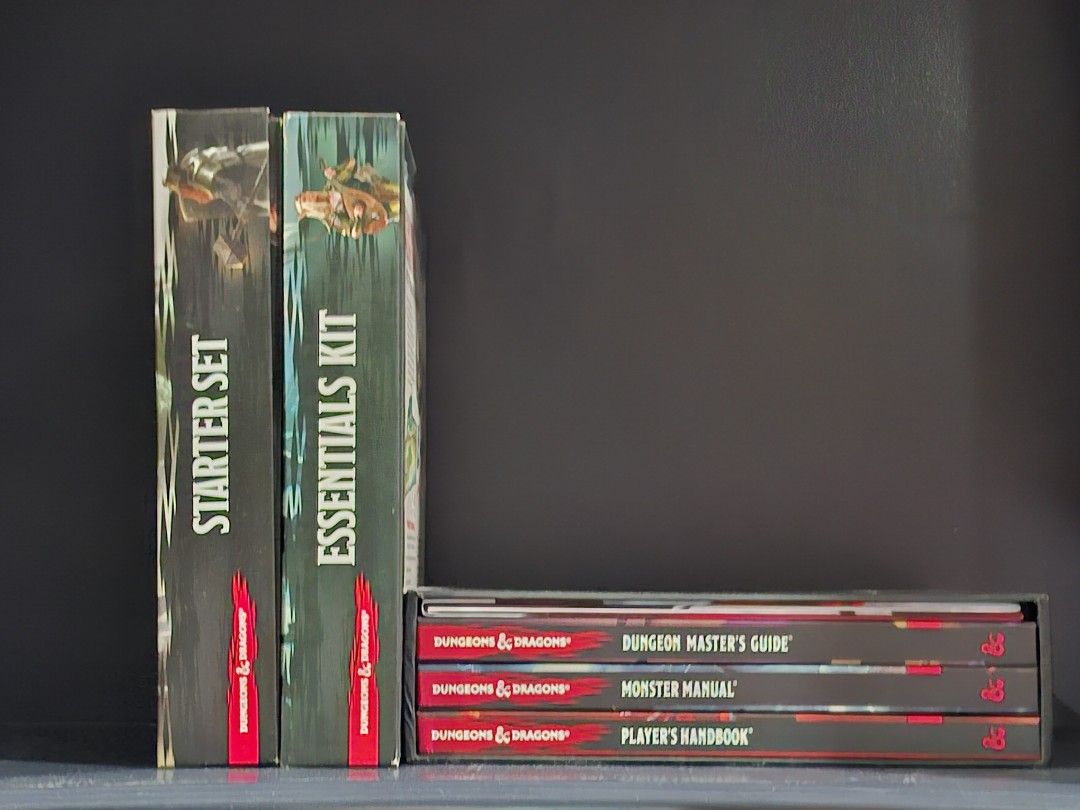 Premium RPG Board Game Bundle: D&D 5e Starter Set + Essentials Kit + Core Rulebooks Gift Set (100% Complete & Pristine) (Category: Board Games & Puzzles) located in Agdangan. Submitted by snowsmum (Listing ID 1469535499, Image 1). Description: Looking for the ultimate all-in-one setup to start or elevate your Dungeons & Dragons 5e adventures? Up for sale is a massive, premium bundle of official D&D 5th Edition materials. Every single item in this