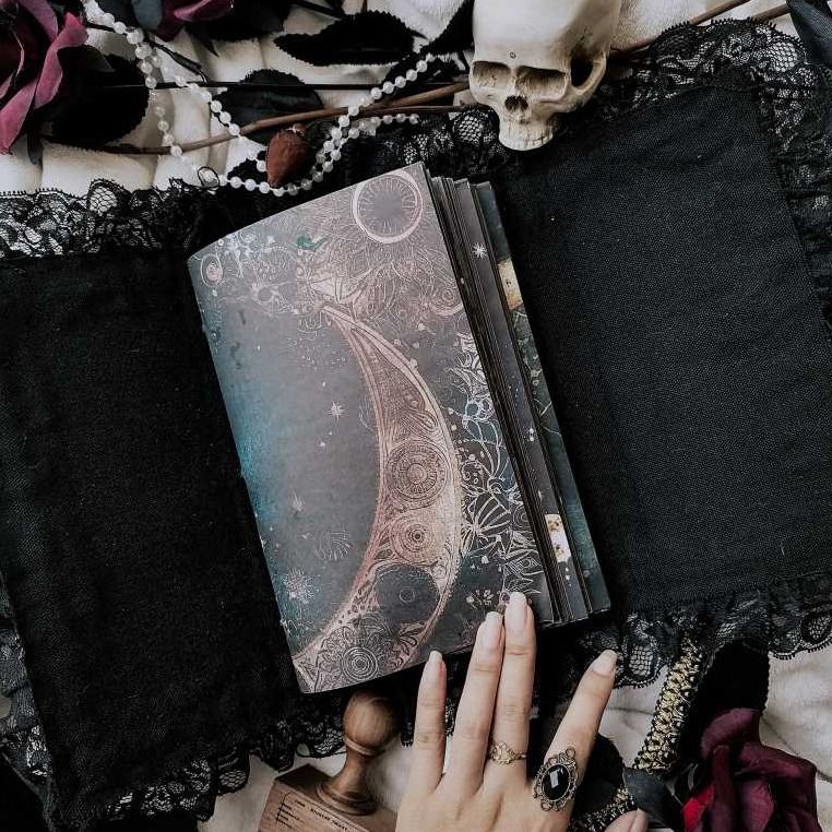 PRE-ORDER Tri-fold folio Clutch Type Blank Journal Galaxy Celestial Moon Handmade Notebook Diary Planner (Category: Stationery & School Supplies) located in San Pedro. Submitted by encrisph (Listing ID 1469452504, Image 1). Description: All journals posted are MADE-TO-ORDER items and have a 2-week processing time unless stated otherwise. SPECIFICATION: - Fabric outer cover - Canvas lining / inner cover - Ruffled lace edges - Metal embellishments 