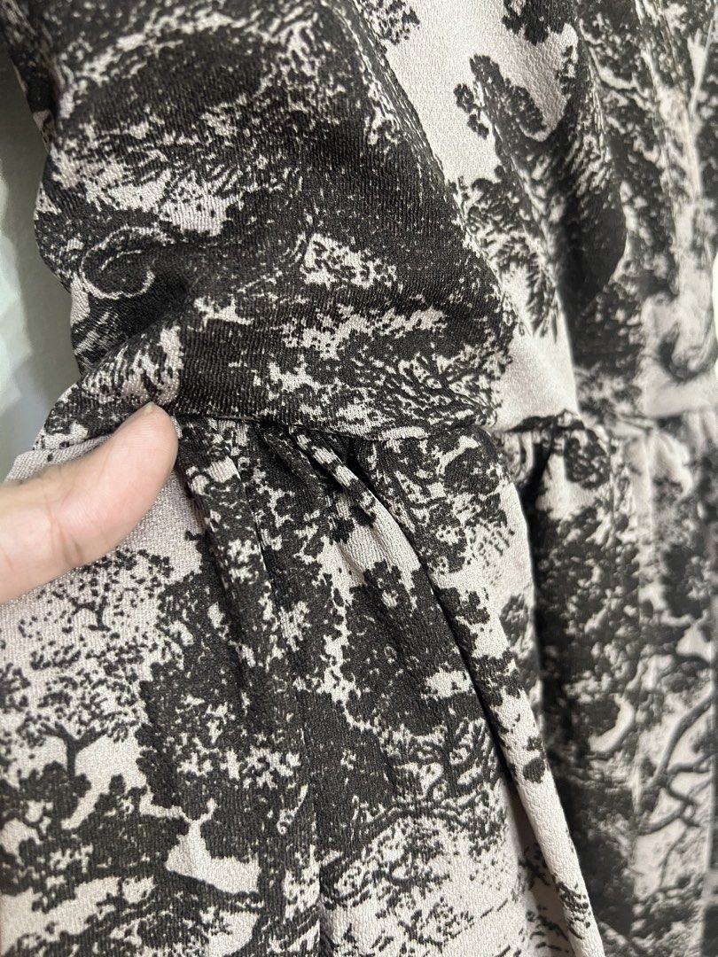 Printed Maxi dress fits Medium to Large (Category: Dresses) located in Quezon City. Submitted by justlei (Listing ID 1469459794, Image 2). Description: BRAND NEW!!! NEVER WORN. - Design: All-over Toile de Jouy nature print in taupe and dark brown - Neckline & Sleeves: V-neckline with short flutter sleeves and padded shoulders - Waistline: Comfortable elastic waist complete with a matching self-tie fabric belt - Skirt: Flowing, tiered skirt sectio