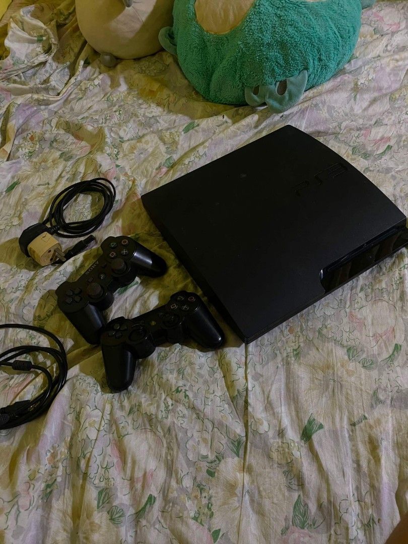 PS3 Slim w/ 2 controllers & pre-installed games (Category: PlayStation) located in Caloocan City. Submitted by oddwater-f921 (Listing ID 1469527367, Image 1). Description: -Price is negotiable - Authentic Sony PlayStation 3 Slim console - Tested and 100% working (screen proof in photos) - Includes 2 working wireless controllers - Comes with power cable and extra connection cables - Condition: Normal signs of handling and light surface dust - Perf