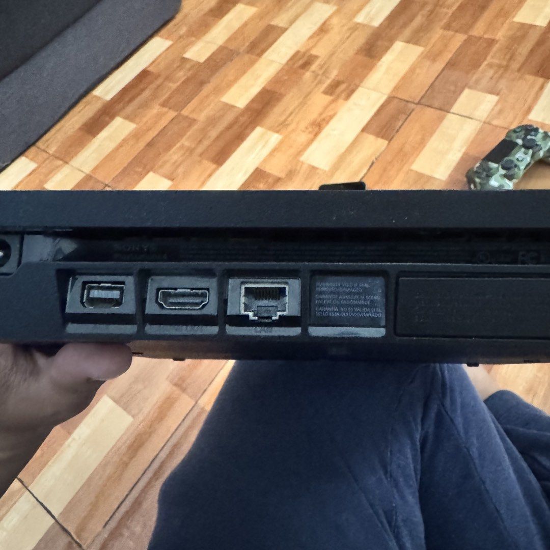 Ps4 slim 1tb JB (Category: PlayStation) located in Manila. Submitted by arvzxc777 (Listing ID 1469411308, Image 3). Description: - Sony PlayStation 4 console in great working condition - Includes 1 stylish green camouflage wireless controller - Comes complete with power cable and necessary wiring - Generous 861.4 GB total storage capacity - Installed with software version HEN 13.52 - All ports and back panel are fully intact and undamaged.