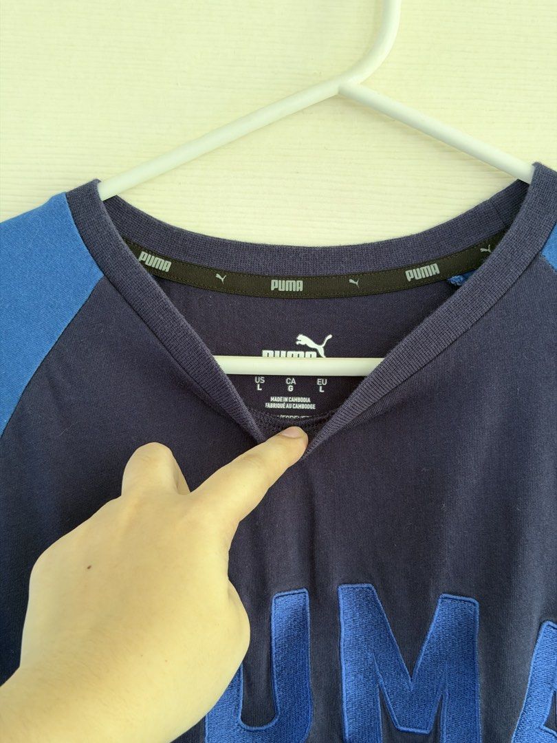 Puma Longsleeves Size Large Blue (Category: Tshirts & Polo Shirts ) located in Manila. Submitted by cinnmoroll (Listing ID 1469402200, Image 2). Description: - Brand: Puma - Color: Navy blue and blue - Size: Large (based on tag) - Style: Raglan sleeves with large Puma chest branding - Origin: Made in Cambodia - Condition: Used only once, excellent shape overall.