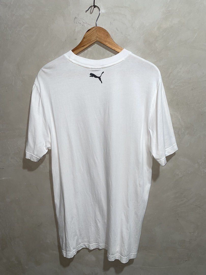 Puma White Graphic T-Shirt (Category: Shirts) located in Zamboanga. Submitted by guthens (Listing ID 1469508362, Image 2). Description: Condition- excellent Issue- none Color rate- 9.5/10 .