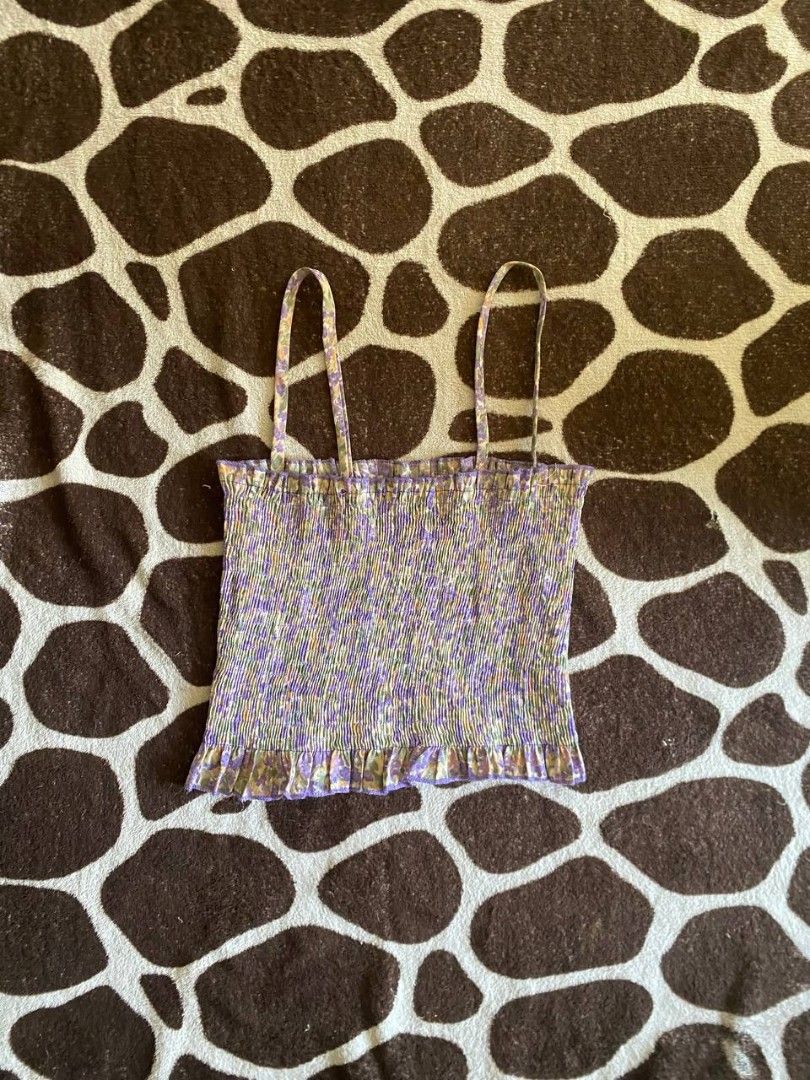 Purple floral smocked cami top with thin straps (Category: Sleeveless) located in Manila. Submitted by ira.needs.cash (Listing ID 1469568521, Image 1). Description: Fit to M to L good as new, used once! .