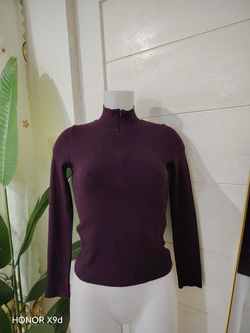 Purple Zip Neck Long Sleeve (Category: Longsleeves) located in Mabalacat. Submitted by Jackikay.PreLoved (Listing ID 1469510142, Image 1). Description: - Brand: Natural Beauty Basic - Color: Deep Purple / Purple - Size: Medium (USA 6 / EUR 36) - Neckline: High mock neck with functional front zipper - Fit: Form-fitting with a cozy ribbed texture - Material: Soft and comfortable, ideal for cooler weather too .