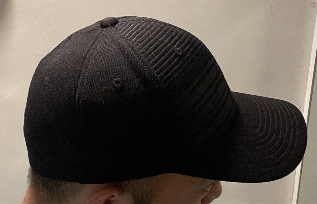 Quiksilver Flexfit Hat Black Size S/M (Category: Caps & Hats) located in Angeles City. Submitted by binostuff (Listing ID 1469515193, Image 2). Description: Selling my Quiksilver black cap. Details: * Color: Black * Textured fabric with ribbed design * Raised Quiksilver logo * Curved brim * Comfortable for casual or outdoor wear Condition: Pre-loved, with normal signs of use. Note: Minor wear/damage on the letter “R” of the Quiksilver logo (see p