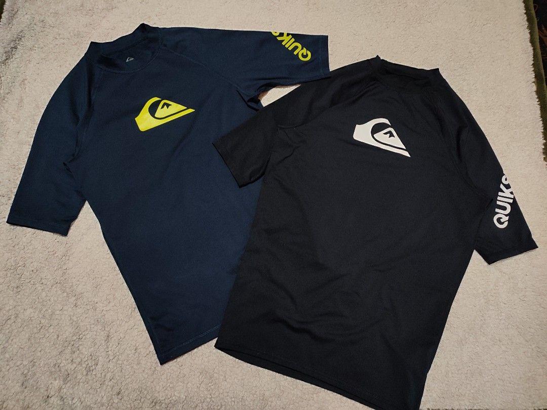 Quiksilver Men's Surf Rash Guard Size M Bundle (Category: Activewear) located in Manila. Submitted by anthonig (Listing ID 1469459914, Image 1). Description: Length: 27.5 (black), 25.5 (blue) Width: 18 (black), 17.5 (blue) Price: 700 pesos Condition: 9.6/10 Issues: none PM if interested or for inquiries Meetups within MANILA only Can do shipping at buyers expense.