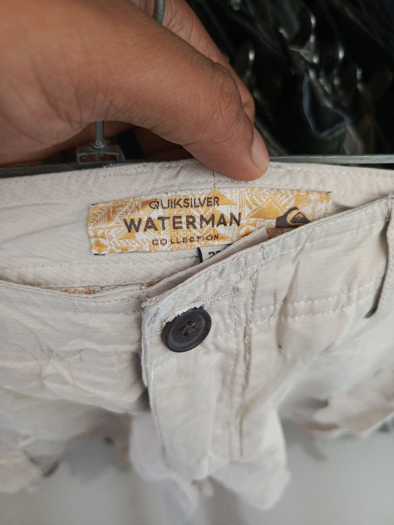Quiksilver Waterman Collection Cargo Shorts (Category: Shorts) located in Cabatuan. Submitted by penthegreat (Listing ID 1469431607, Image 3). Description: Size 33 on tag Quiksilver Waterman Collection cargo shorts in beige. Multiple utility pockets including zippered back pockets with pull cords. Durable button closure and belt loops. Casual outdoor style..