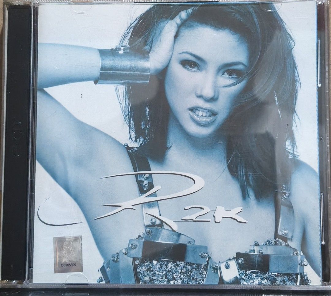 R2K CD Album Viva Records (Category: CDs & DVDs) located in Manila. Submitted by ruelcabrer77078 (Listing ID 1469555625, Image 1). Description: Regine Velasquez R2K album released by Viva Records in 1999. Includes jewel case, booklet insert printed on Epson transparency paper, and compact disc. Disc has handwritten markings in marker. Case has minor scratches from regular storage. Playable audio disc..