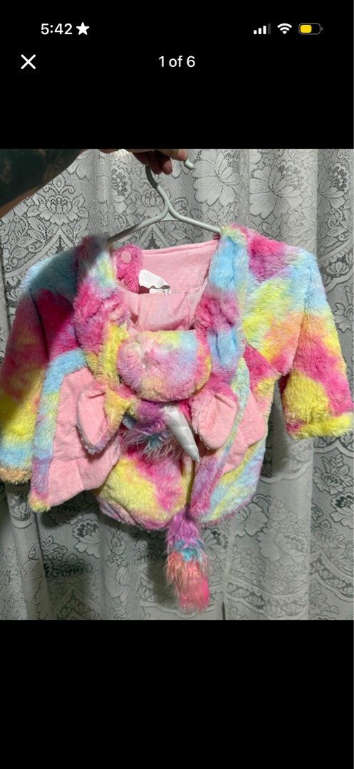 Rainbow Unicorn Fluffy Jacket with Wings and Tail (Category: Coats, Jackets and Outerwear) located in Las Pinas. Submitted by yourboki.2026 (Listing ID 1469523676, Image 1). Description: - Fuzzy multicolored unicorn jacket in vibrant pastel rainbow shades (pink, yellow, blue) - Features cute 3D pink plush wings on the back and a matching tail at the hem - Hooded design with a furry mane, plus silver horn and ears on the front - Made from ultra-so
