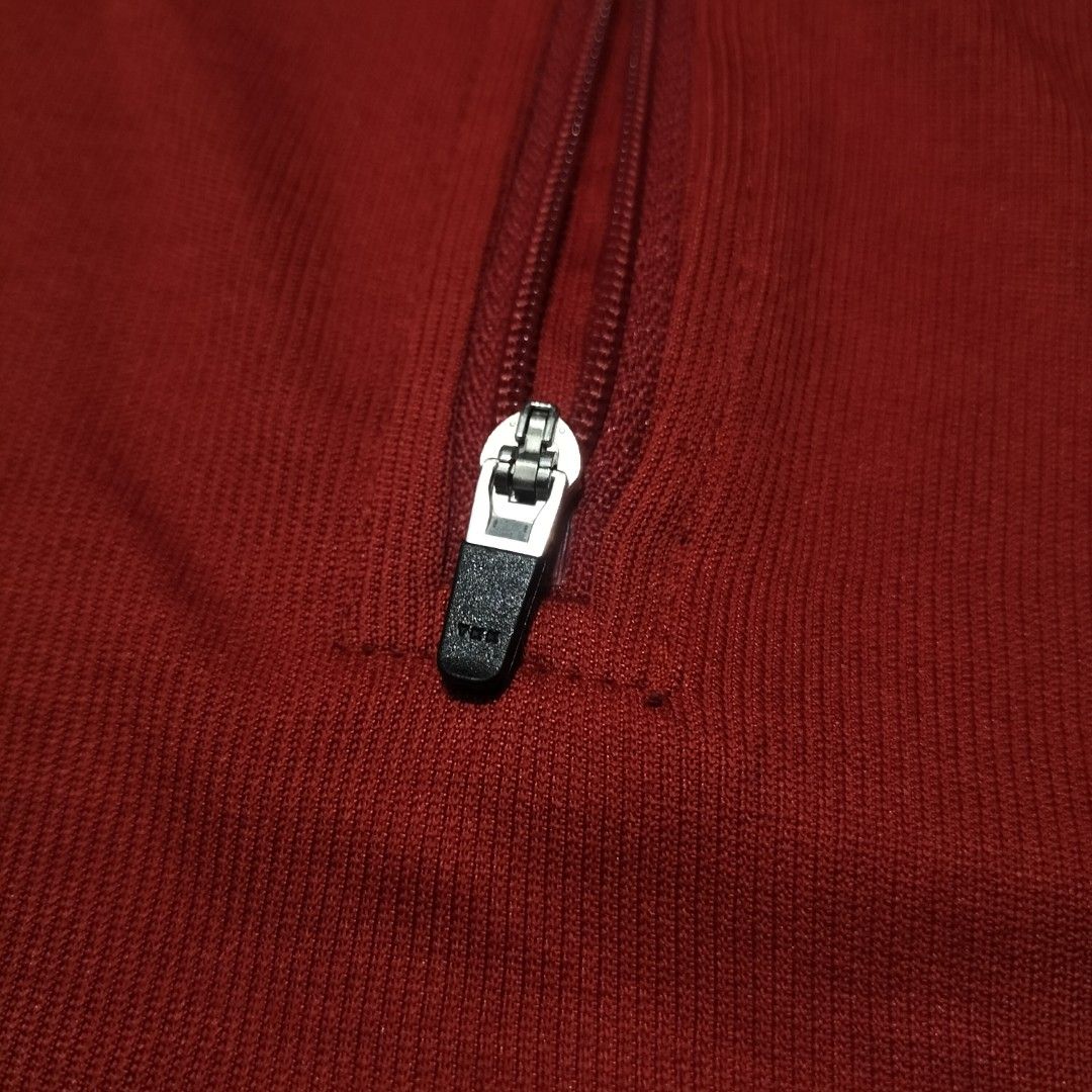 Rapha Short Sleeve Cycling Jersey Red White (Category: Activewear) located in Taytay. Submitted by calmtree-6248 (Listing ID 1469536803, Image 2). Description: - Brand: Rapha - Color: Bright red with light blue chest stripe - Design: Short sleeve, half zip neck closure, and high collar - Fit/Features: Dropped hem with black and white grip band at the back - Material: Lightweight, breathable fabric ideal for road cycling - Condition: Clean bright 