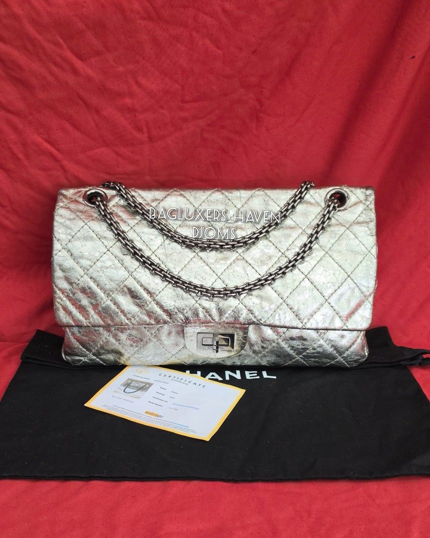 🛑Rare Chanel 2.55 Reissue Medium Double Flap Silver Quilted Bag (Category: Luxury Bags & Wallets) located in Baguio. Submitted by bagluxers_haven (Listing ID 1469441220, Image 1). Description: 🛑Authentic Rare Chanel 2.55 Reissue Metallic Silver Medium Double Flap Bag in Quilted Aged Calfskin Leather Along w/ Ruthenium Hardware Sliding Chain Strap & Mademoiselle Turn Lock Closure 》Series 11, Year 2006 - 2008 🛑Still in Very Good Condition & come