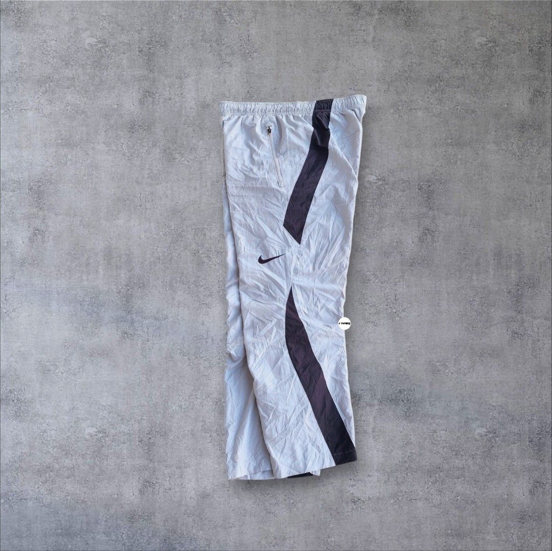 Rare Nike Trackpants Embroidered (Category: Activewear) located in Pasig City. Submitted by j.ownerss (Listing ID 1469519551, Image 1). Description: FOR SALE‼️RARE NIKE TRACKPANTS‼️ ₱750 ONLY Logo Embroidered 2 zip pockets Double lining Condition: 9.5/10 Flaws: needs wash only Waistline: 20-36 Length: 38 Hem: 9.5 Pickup: Allegra Garden Place Pasig Delivery via Lalamove or J&T courier, strictly payments first through GCash or MariBank Open for res