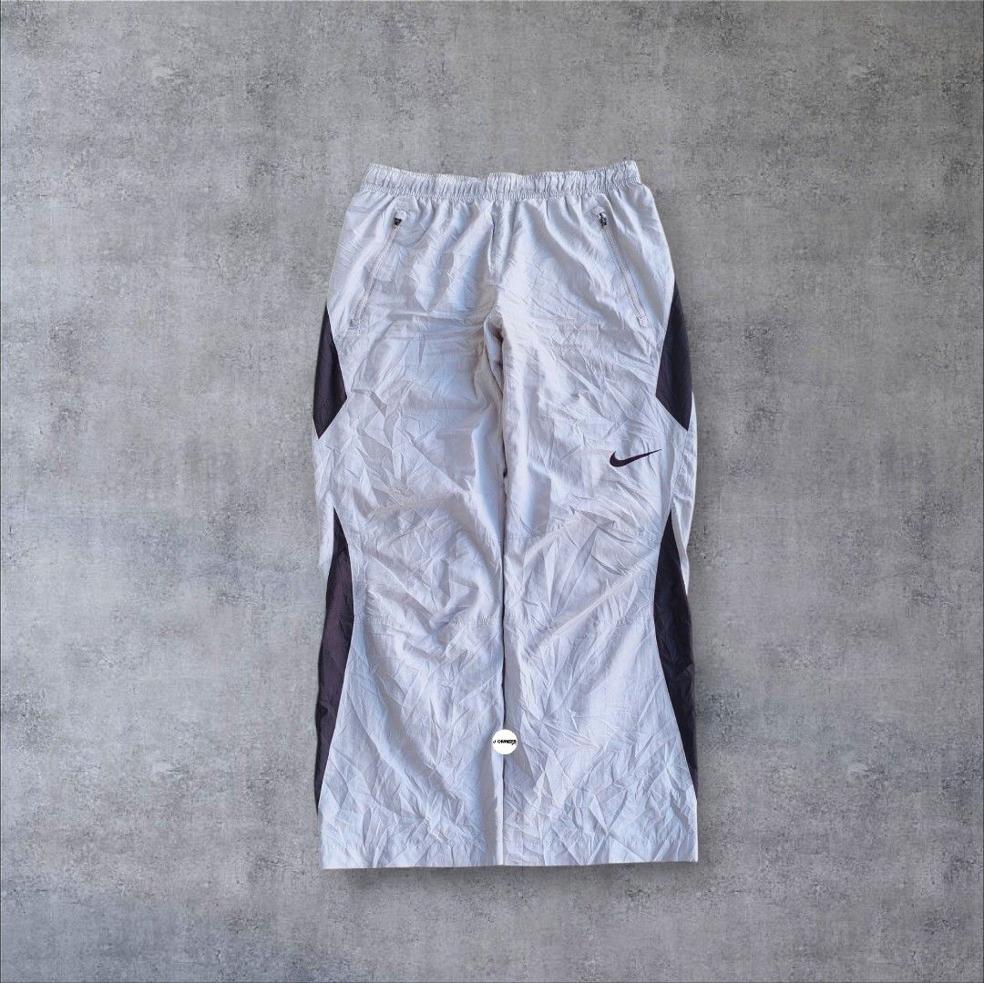 Rare Nike Trackpants Embroidered (Category: Activewear) located in Pasig City. Submitted by j.ownerss (Listing ID 1469519551, Image 2). Description: FOR SALE‼️RARE NIKE TRACKPANTS‼️ ₱750 ONLY Logo Embroidered 2 zip pockets Double lining Condition: 9.5/10 Flaws: needs wash only Waistline: 20-36 Length: 38 Hem: 9.5 Pickup: Allegra Garden Place Pasig Delivery via Lalamove or J&T courier, strictly payments first through GCash or MariBank Open for res