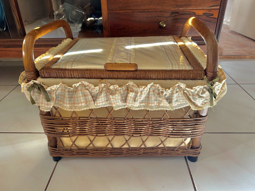 RATTAN WOVEN BASKET (Category: Storage Boxes & Baskets) located in Polangui. Submitted by joycehaul (Listing ID 1469399632, Image 3). Description: A rattan storage, toys storage laundry basket with a hinged lid, curved side handles, and a ruffled plaid fabric liner. Japan Surplus Items. Location: Albay We ship via J&T courier.