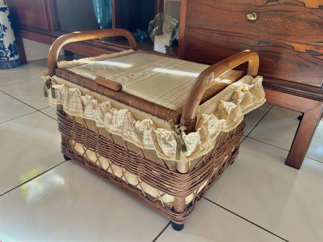 RATTAN WOVEN BASKET (Category: Storage Boxes & Baskets) located in Polangui. Submitted by joycehaul (Listing ID 1469399632, Image 2). Description: A rattan storage, toys storage laundry basket with a hinged lid, curved side handles, and a ruffled plaid fabric liner. Japan Surplus Items. Location: Albay We ship via J&T courier.