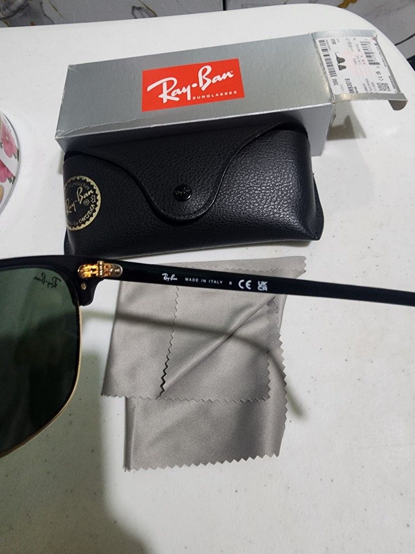 Ray-Ban Clubmaster RB3016 Sunglasses (Category: Sunglasses & Eyewear) located in Pasay City. Submitted by anicoapostol19 (Listing ID 1469432933, Image 3). Description: - Brand: Ray-Ban - Model: Clubmaster RB3016 W0365 - Frame Color: Classic Black & Gold - Lens Color: Green - Size: 49-21-140 - Origin: Made in Italy - Inclusions: Original leather case, cleaning cloth, outer box, and tag - Condition: Brand new / Excellent (Ready to ship).