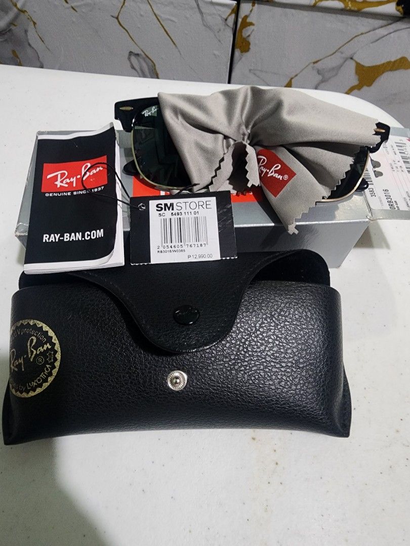 Ray-Ban Clubmaster RB3016 Sunglasses (Category: Sunglasses & Eyewear) located in Pasay City. Submitted by anicoapostol19 (Listing ID 1469432933, Image 1). Description: - Brand: Ray-Ban - Model: Clubmaster RB3016 W0365 - Frame Color: Classic Black & Gold - Lens Color: Green - Size: 49-21-140 - Origin: Made in Italy - Inclusions: Original leather case, cleaning cloth, outer box, and tag - Condition: Brand new / Excellent (Ready to ship).