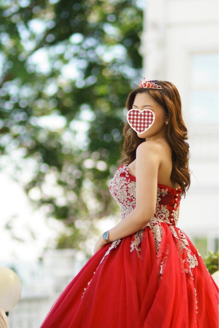 Red Gown (Category: Evening dresses & gowns) located in Manila. Submitted by jei_sol (Listing ID 1469553381, Image 2). Description: CAN FIT SMALL TO SEMI LARGE you have the option to button the back or put a lace up corset :) - Color: Vibrant red with intricate silver embroidery on the bodice and waist - Design: Has straps but can also be worn strapless as seen in the photo - Sweetheart neckline with a dramatic long sheer train - Fit: Adjustable 