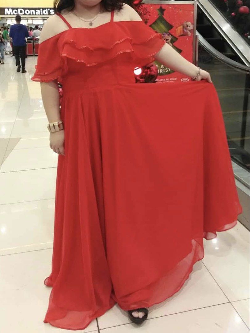 Red Off-Shoulder Ruffle Maxi Dress (Category: Dresses) located in Marikina City. Submitted by boutiquekoh (Listing ID 1469415692, Image 1). Description: - Color: Bright red - Style: Cold-shoulder maxi dress with spaghetti straps and layered chest ruffles - Material: Flowy, floor-length chiffon - Condition: Worn once for a holiday party - Fit: Great length and very comfortable to walk in.
