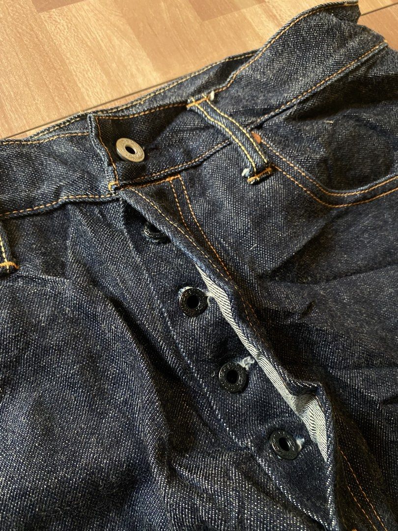 Red Tornado Raw Denim Jeans W36 L32 (Category: Jeans) located in Pandi. Submitted by nasya_thrift_collection2023 (Listing ID 1469415221, Image 3). Description: - Brand: Red Tornado - Color: Dark indigo wash - Size: 35 - 36 - Fit: Straight leg with button fly - Details: Classic five-pocket setup, contrast stitching, and back leather patch - Material: 100% rigid unwashed cotton - Condition: Excellent, inner care tag intact.
