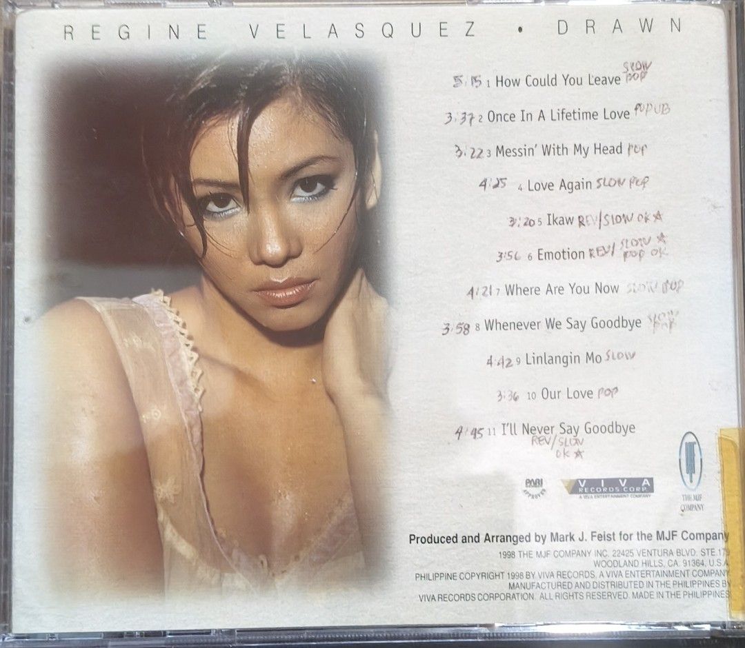 Regine Velasquez - Drawn CD Album (Category: CDs & DVDs) located in Manila. Submitted by ruelcabrer77078 (Listing ID 1469555186, Image 3). Description: - Artist & Title: Regine Velasquez - Drawn - Release Year: 1998 - Label: Viva Records - Includes: Original jewel case - Notable tracks: How Could You Leave, Once In A Lifetime Love, Messin' With My Head, Love Again, and more - Condition note: Back insert features handwritten notes next to song tit