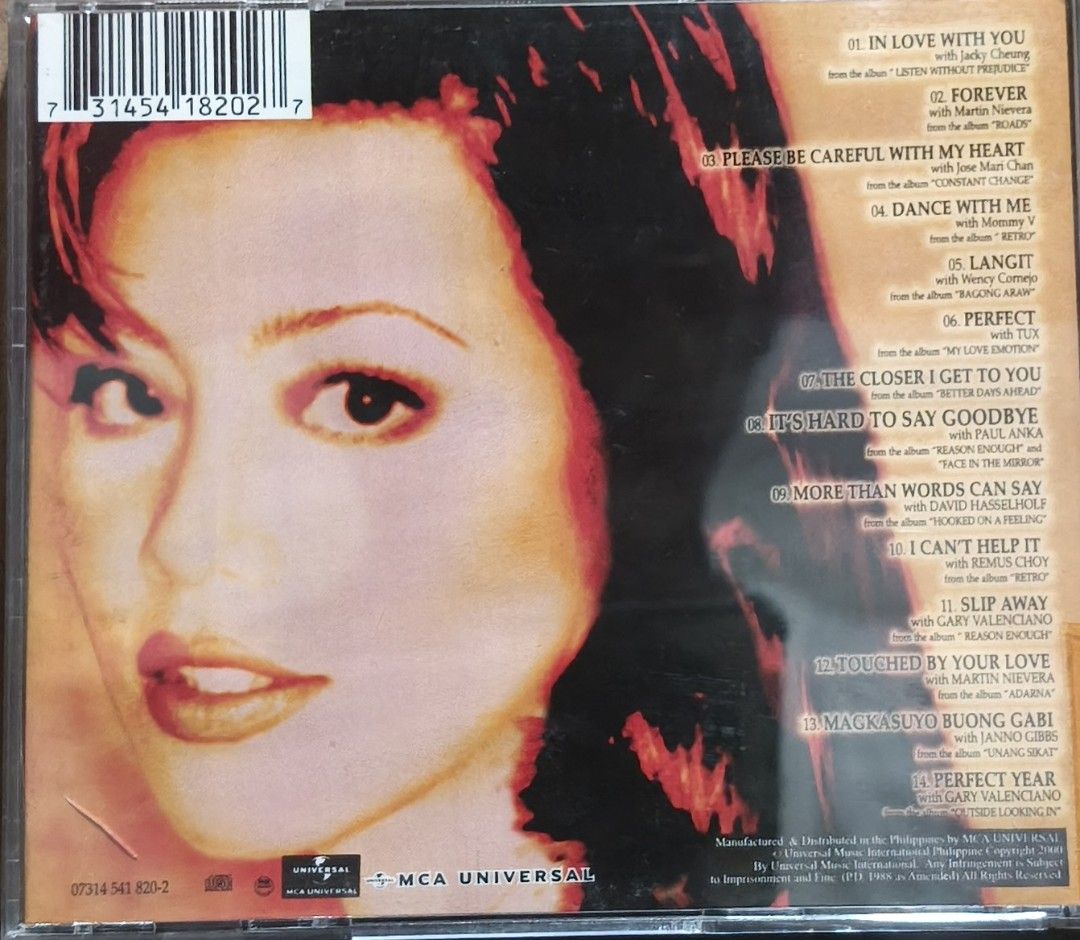 Regine Velasquez - Un Solo CD Album (Category: CDs & DVDs) located in Manila. Submitted by ruelcabrer77078 (Listing ID 1469556021, Image 3). Description: - Artist: Regine Velasquez - Album: Un Solo - Release Year: 2000 - Label: MCA Universal - Tracklist: 14 duets featuring Jacky Cheung, Martin Nievera, Gary Valenciano, and more - Inclusion: Standard jewel case with front insert, back insert, and original disc - Condition: Minor markings written o