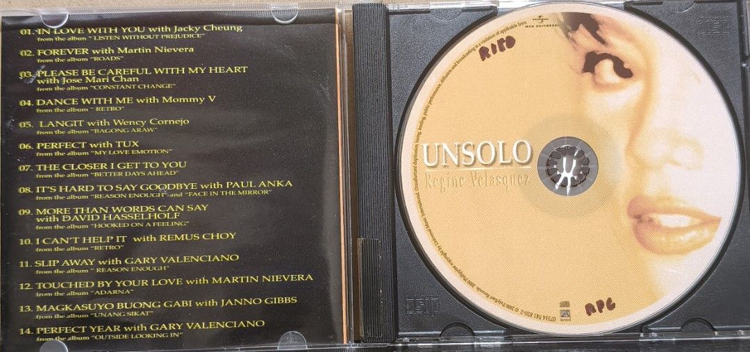 Regine Velasquez - Un Solo CD Album (Category: CDs & DVDs) located in Manila. Submitted by ruelcabrer77078 (Listing ID 1469556021, Image 2). Description: - Artist: Regine Velasquez - Album: Un Solo - Release Year: 2000 - Label: MCA Universal - Tracklist: 14 duets featuring Jacky Cheung, Martin Nievera, Gary Valenciano, and more - Inclusion: Standard jewel case with front insert, back insert, and original disc - Condition: Minor markings written o