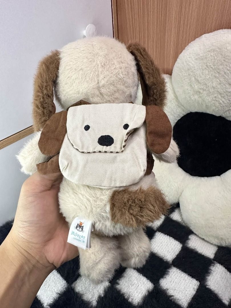 ✬RETIRED✬ Jellycat : Backpack Puppy (Category: Plushies & Soft Toys) located in Quezon City. Submitted by genie.fluff (Listing ID 1469566069, Image 2). Description: Product Details Dimensions: 22cm x 9cm x 8cm Sitting Height: 17cm Main Materials: Polyester, Cotton Inner Filling: Polyester Fibres, PE Beans Embroidered Eye Removable Backpack SKU: BP4PU.