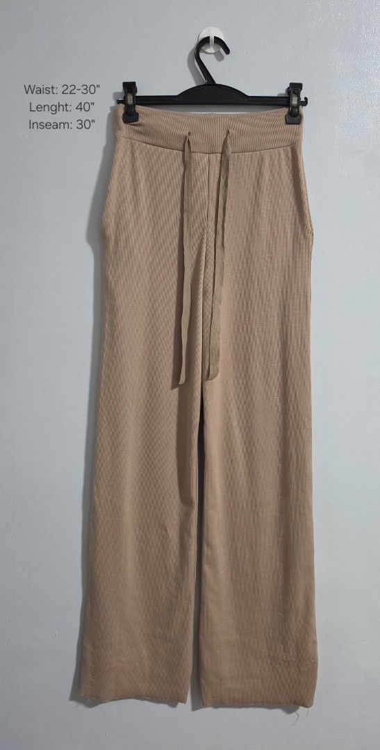 Ribbed Knit Wide Leg Pants Drawstring Beige (Category: Jeans) located in Paranaque City. Submitted by franinnashop (Listing ID 1469478446, Image 1). Description: Declutter - Color: Light brown beige - Material: Soft ribbed knit - Fit: Relaxed wide-leg with high waist and adjustable drawstring - Features: Convenient deep side pockets - Perfect for: Lounging or casual daily wear - Note: Please check photos for exact measurements.