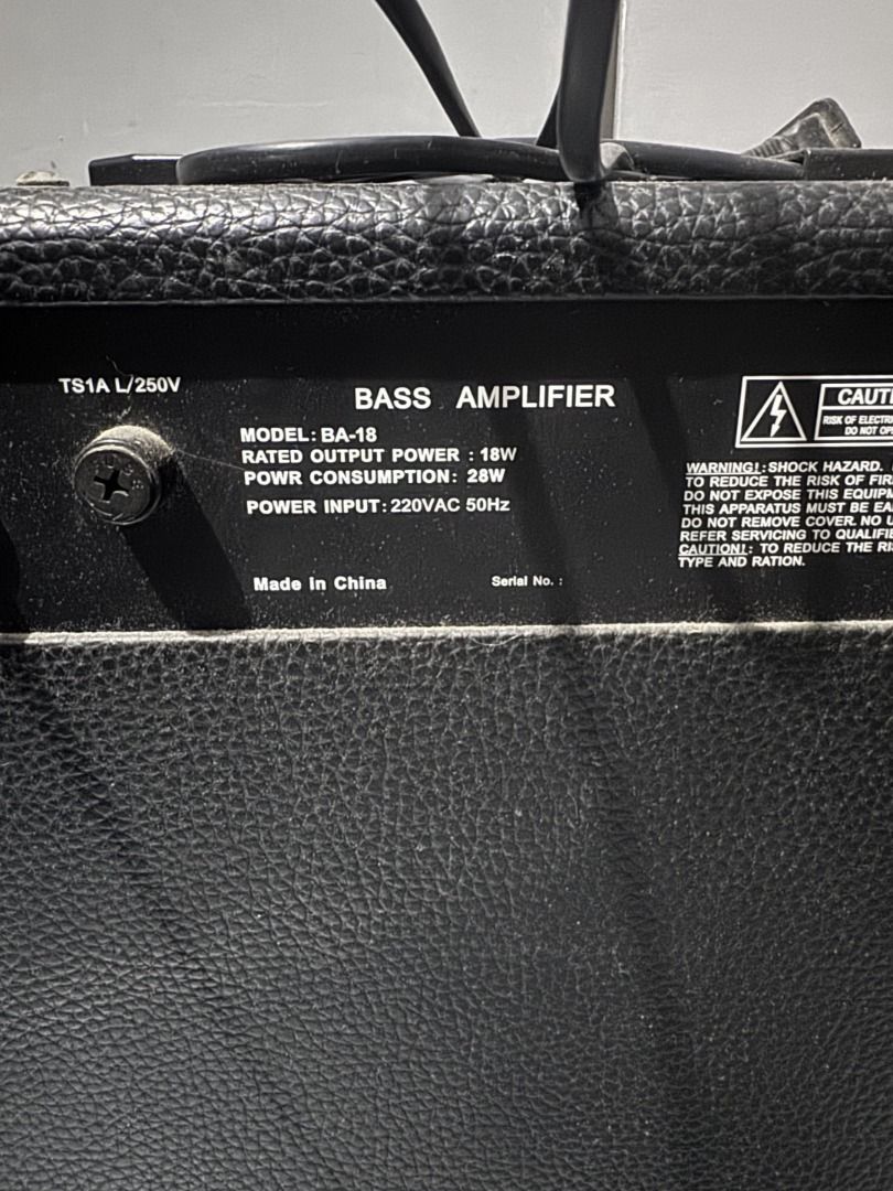 RJ BA-18 18W Bass Amplifier (Category: Musical Instruments) located in Las Pinas. Submitted by cxvjm (Listing ID 1469567553, Image 2). Description: - Brand/Model: RJ BA-18 Bass Amplifier - Power: 18 watts output (28W power consumption, 220VAC 50Hz) - Tone Control: 3-band equalizer (Bass, Middle, Treble) plus Presence and Volume knobs - Connectivity: Standard input jack and built-in headphone output slot - Design: Convenient right-side power switc