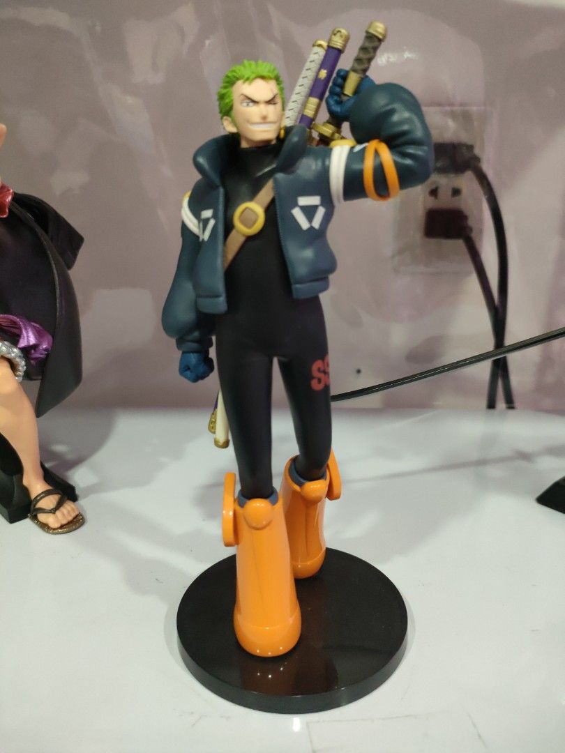 Roronoa Zoro (Category: Figurines & Statues) located in Bulacan. Submitted by hunterherojapanjdm (Listing ID 1469478964, Image 1). Description: Banpresto One Piece The Shukko - Roronoa Zoro (Egghead Ver.) figure, standing roughly 17 cm (6.7 inches) tall and featuring Zoro in his futuristic Egghead Island arc outfit from One Piece..