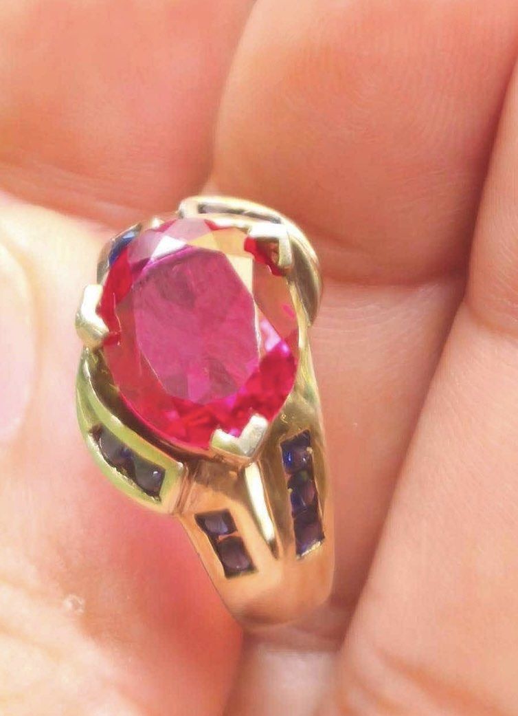 Ruby with Fasceted Blue Sapphire Stones (Category: Rings) located in Cauayan City . Submitted by espiritucj (Listing ID 1469430198, Image 2). Description: Japan Haul Big MM si Ruby stone With markingss- - Gold band cocktail ring - Large oval-cut ruby center - faceted sapphire stones - Hallmarks stamped inside the band - Unique statement piece.