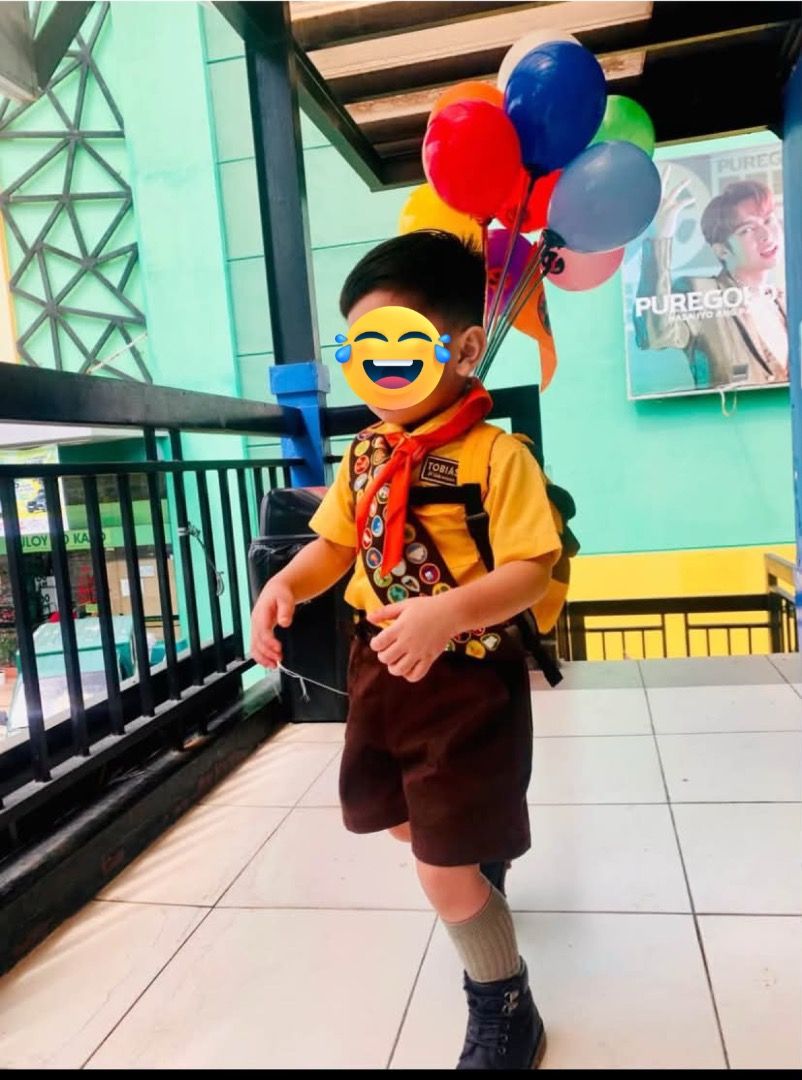 RUSSELL - UP COSTUME FOR RENT (Category: Babies & Kids Fashion) located in Manila. Submitted by enajacl (Listing ID 1469546145, Image 1). Description: FOR RENT - Traditional Boy Scout uniform for young boys - Set includes: yellow short-sleeve button-up shirt and matching brown shorts - Accessories: Red neckerchief included - Details: Multiple embroidered badges sewn on the right sleeve and front pocket - Fit & Quality: Standard fit, clean fabric,