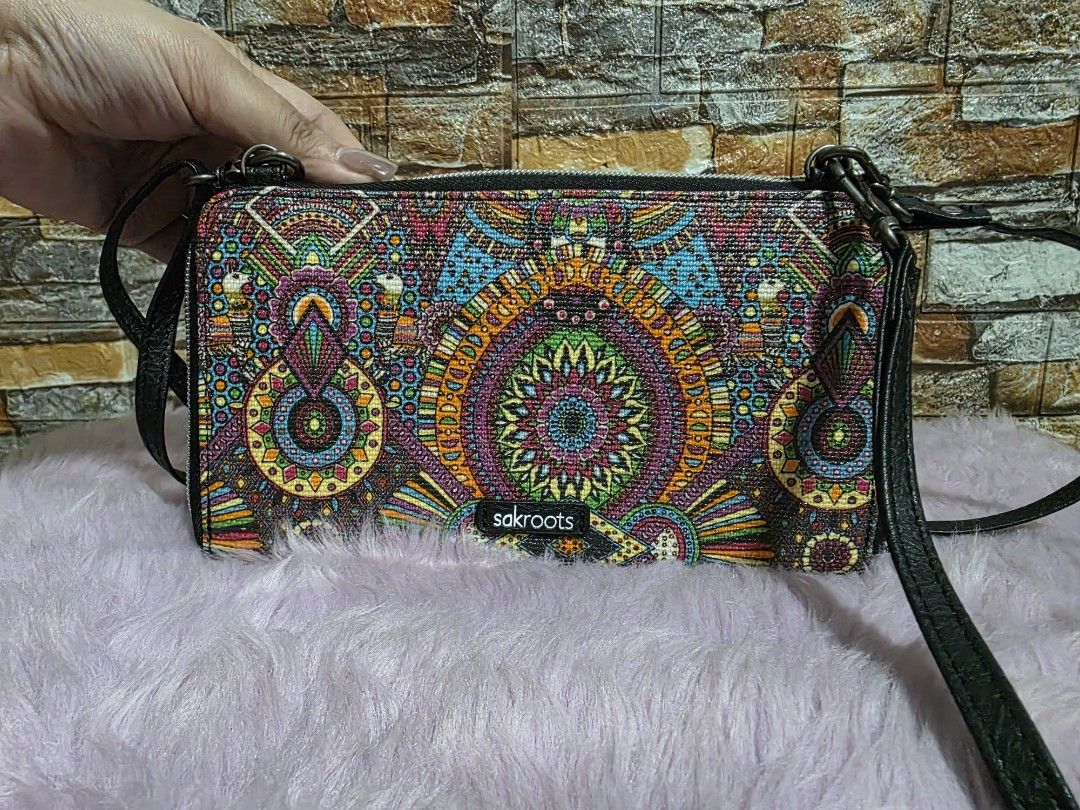 Sakroots Crossbody Wallet (Category: Wallets & Card holders) located in Binan City. Submitted by elli.etcetera (Listing ID 1469510437, Image 2). Description: MOP: Gcash, Maya or Bank transfer Courier: Flash, J&T or Lalamove.
