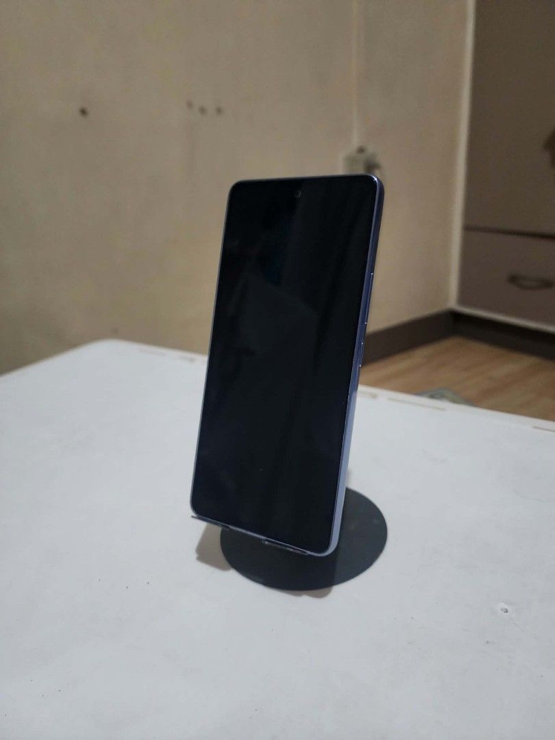 Samsung A53 (Category: Samsung) located in Manila. Submitted by burgosrl (Listing ID 1469543933, Image 2). Description: 📱 **FOR SALE: Samsung Galaxy A53 5G** ✅ 128GB Storage ✅ 8GB RAM ✅ All Working Condition ✅ From Company Bidding 🎨 **Available Colors:** 🔵 Blue ⚫ Black 🤝 **Meet-up to Check and Test** 📍 Cubao or nearby areas You may personally inspect and test the unit before purchasing for your peace of mind. 📩 PM for price and inquiries. F
